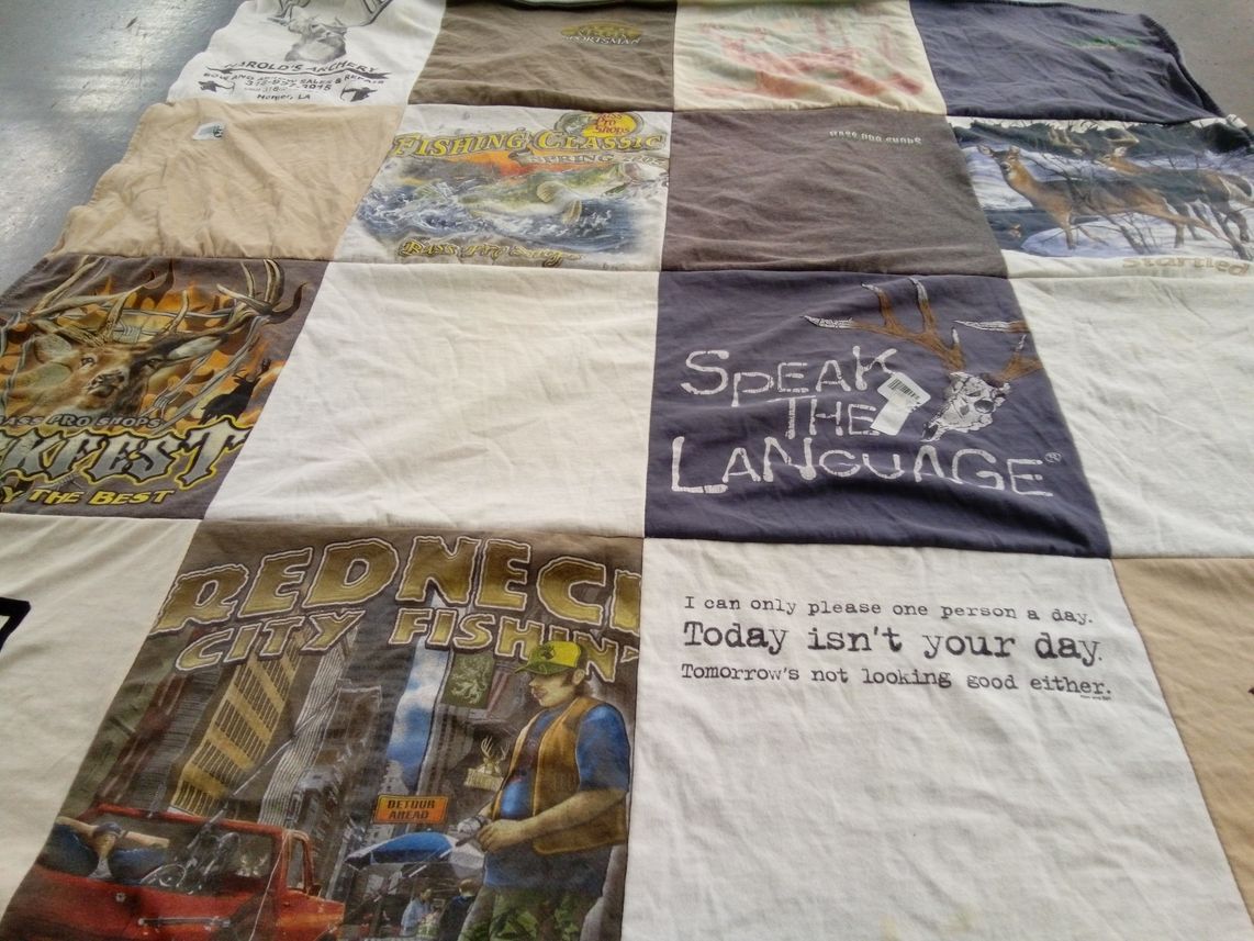 T-shirt quilt with fishing, hunting themes by Paula from AR