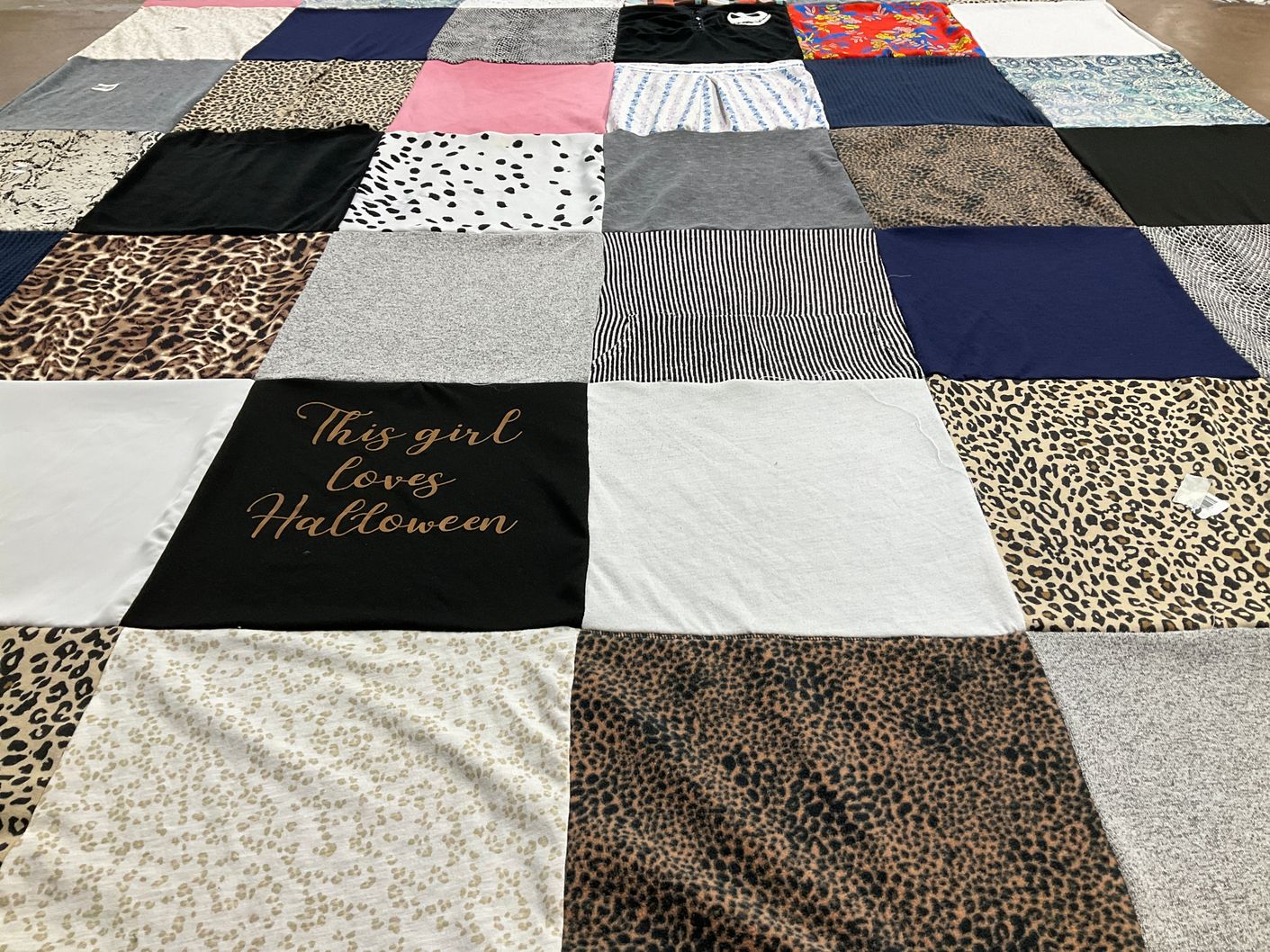 T-shirt quilt with halloween themes by Roseann from CA