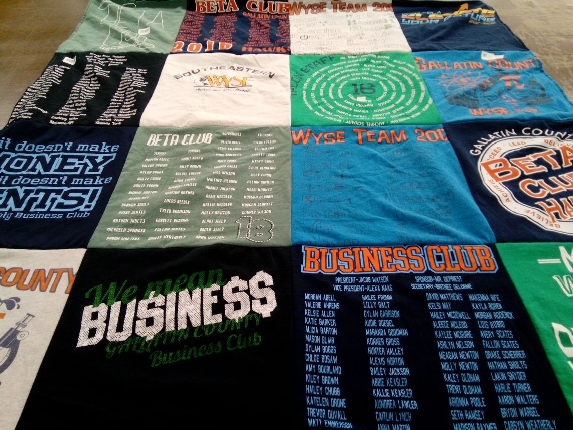 T-shirt quilt with education, business themes by Rosemary from IL