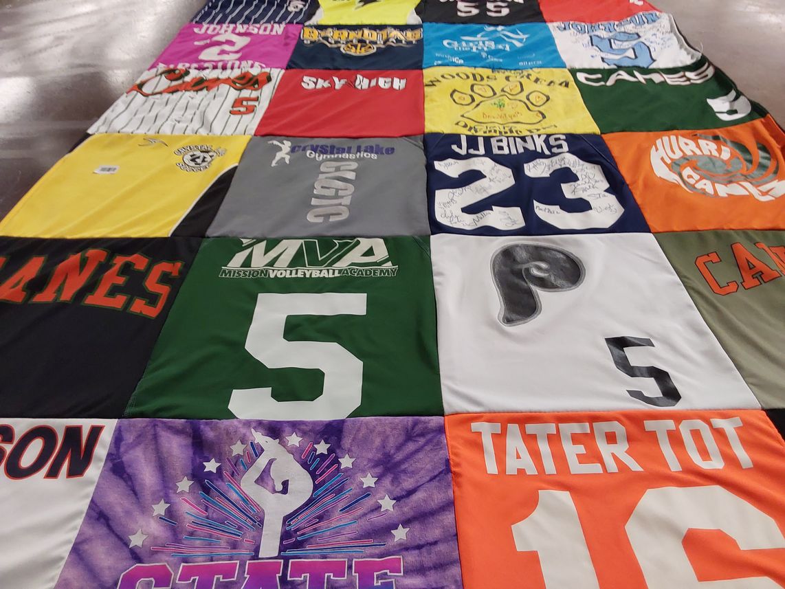 T-shirt quilt with volleyball, gymnastics themes by Jillian from IL