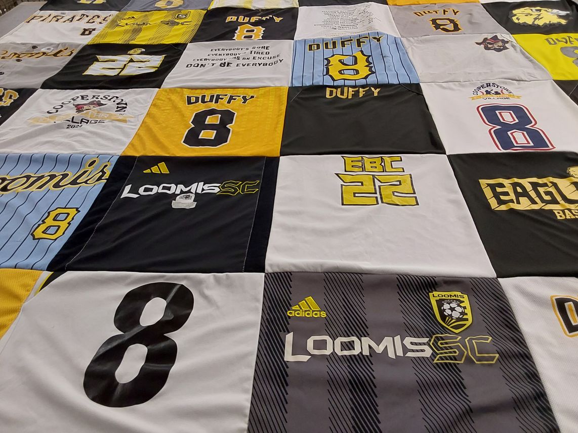 T-shirt quilt from loomis college by Anna from CA