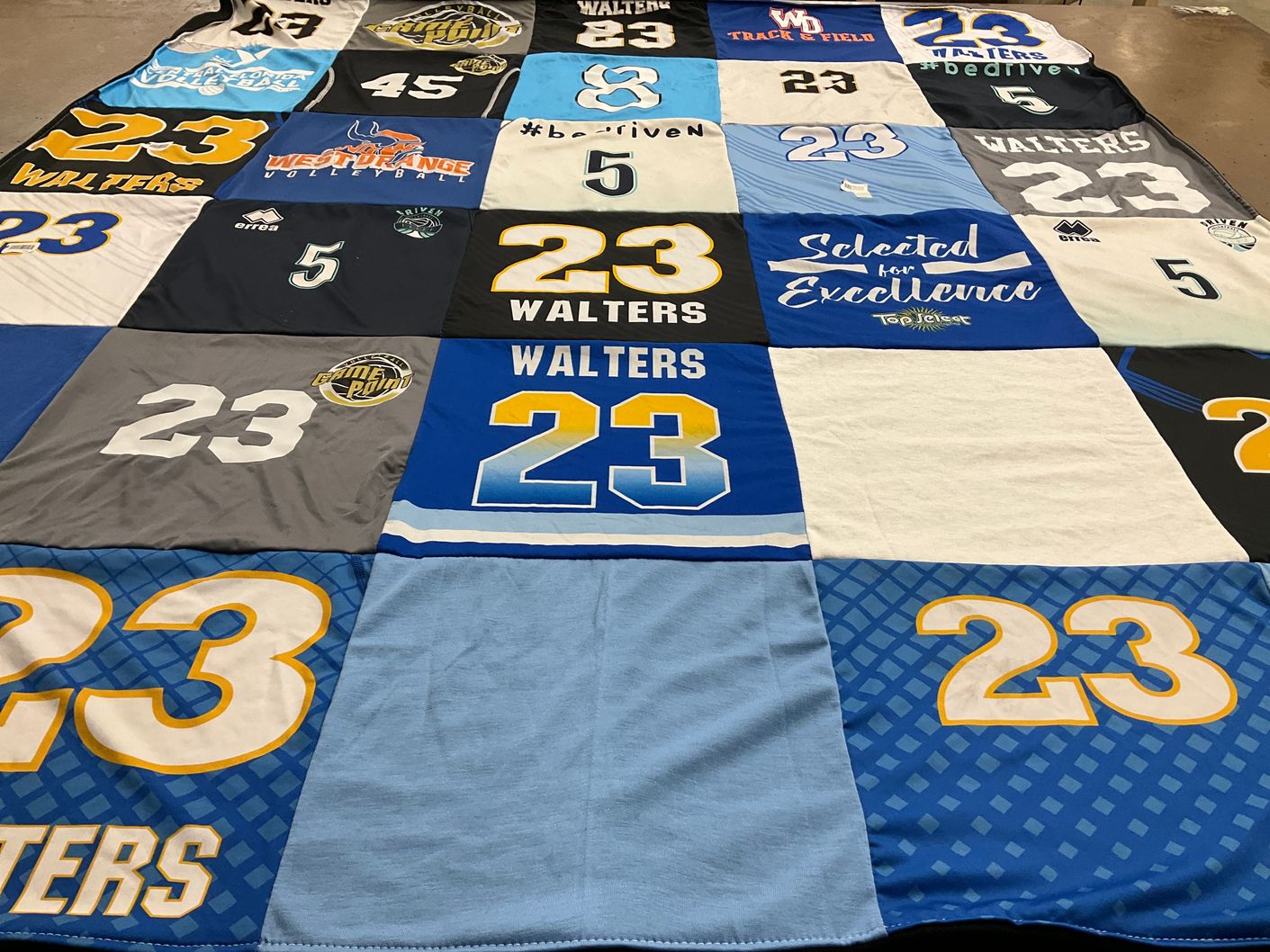 T-shirt quilt with sports, volleyball themes by Ian from FL