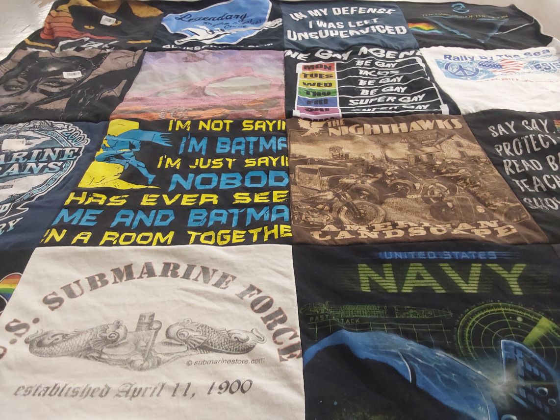 T-shirt quilt with comics, military themes by Alison from FL