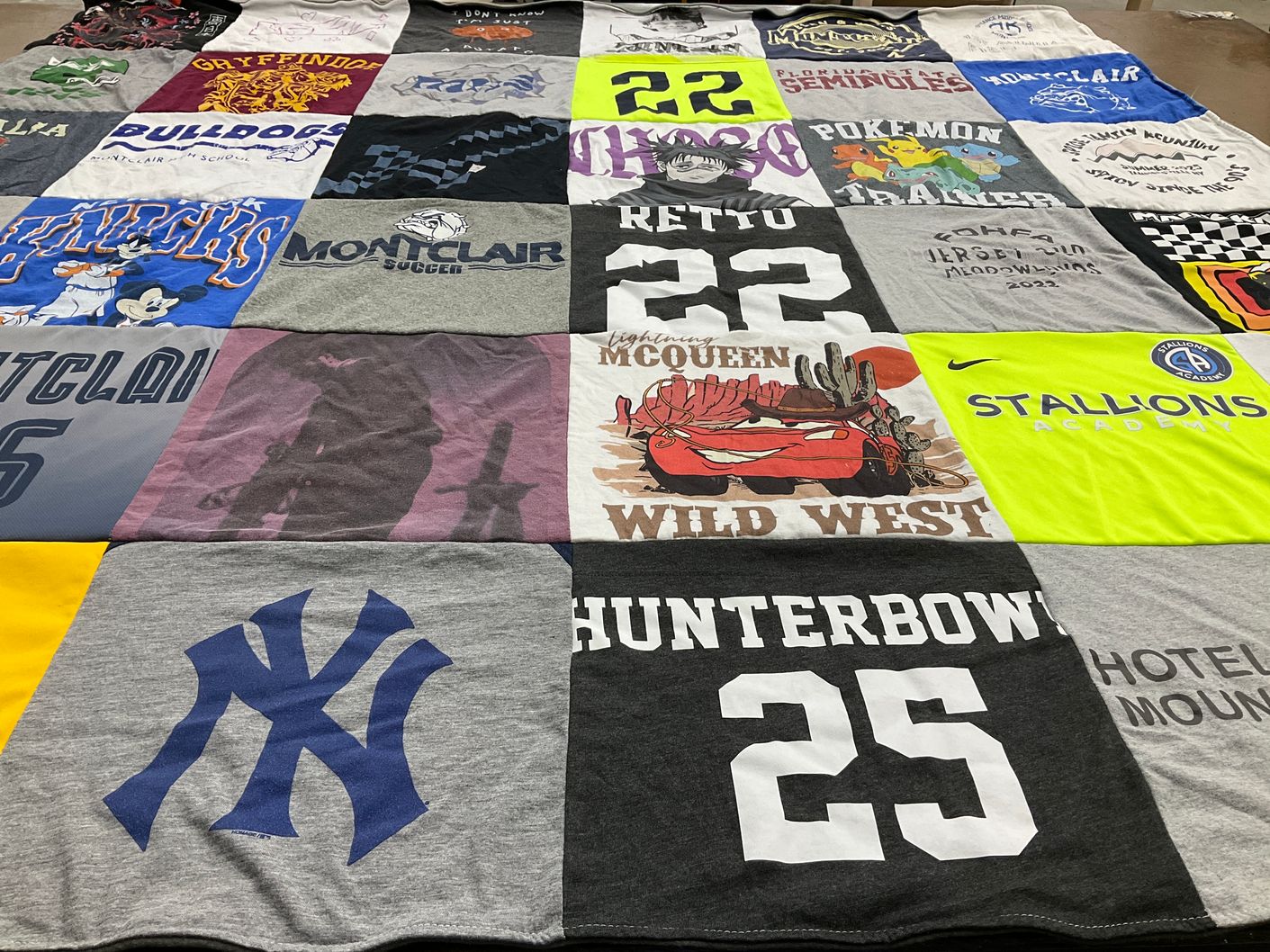 T-shirt quilt featuring stallions academy by Azie from NJ