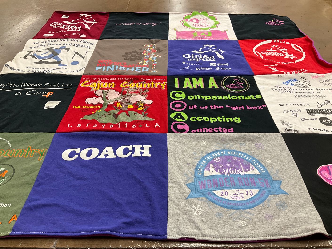 T-shirt quilt with running, community themes by Janee' from FL