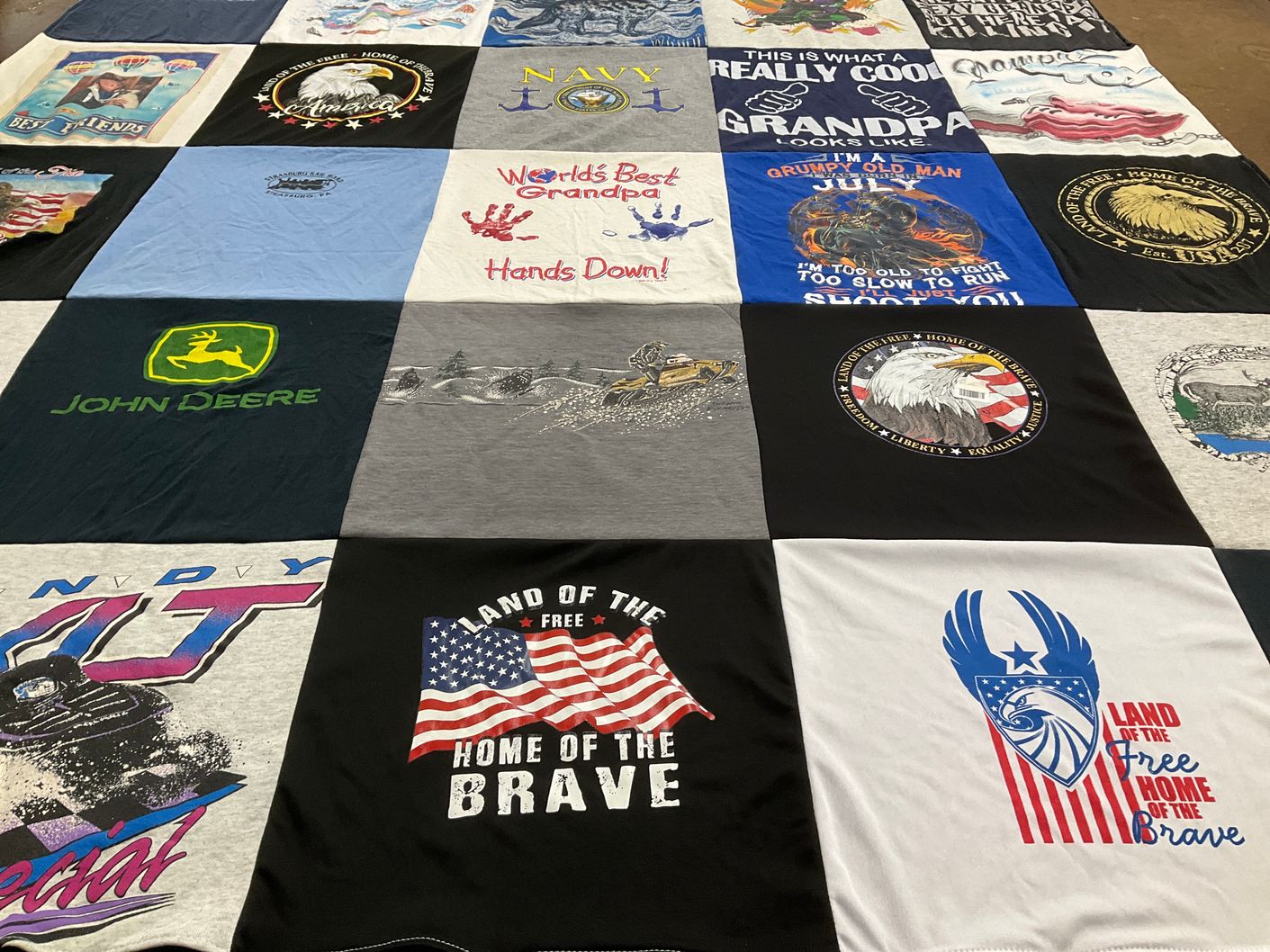 T-shirt quilt with farming, military themes by Windy from NH