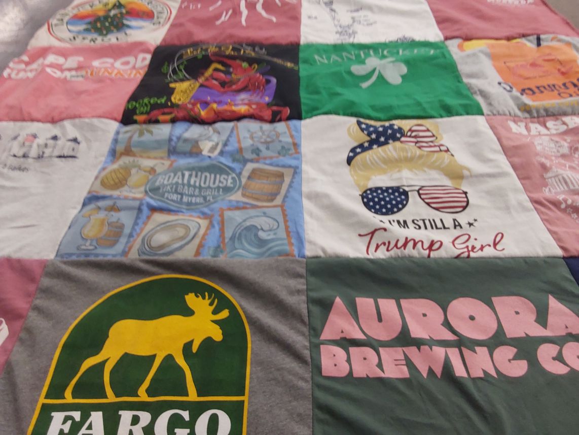 T-shirt quilt with travel, beer themes by Susan from NY