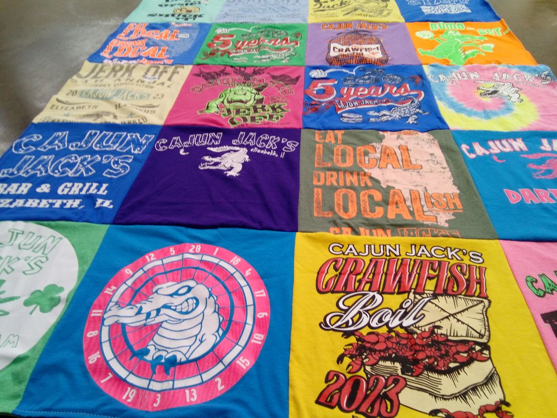 T-shirt quilt with cajun cuisine, local events themes by MJ from IL