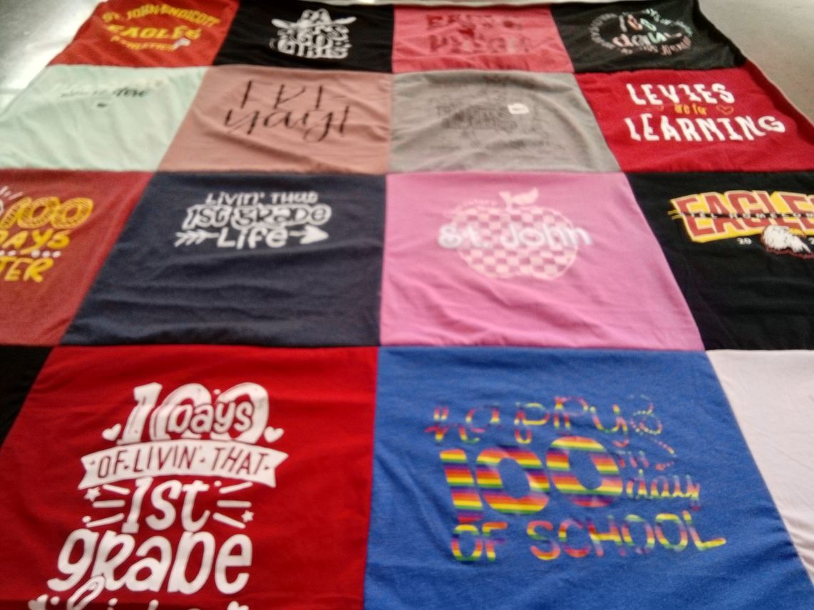 T-shirt quilt from st john the evangelist school by Sara from WA