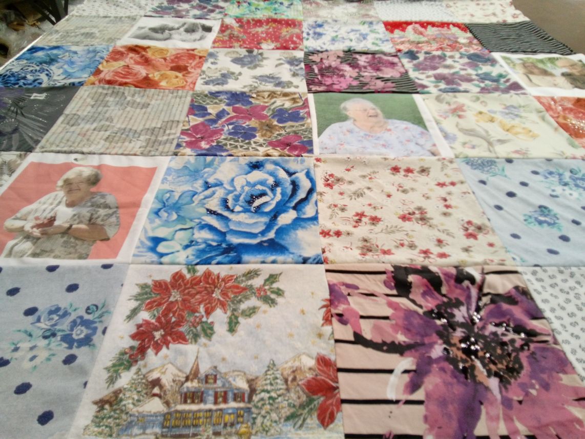 T-shirt quilt with quilting, textile art themes by Sharla from TN