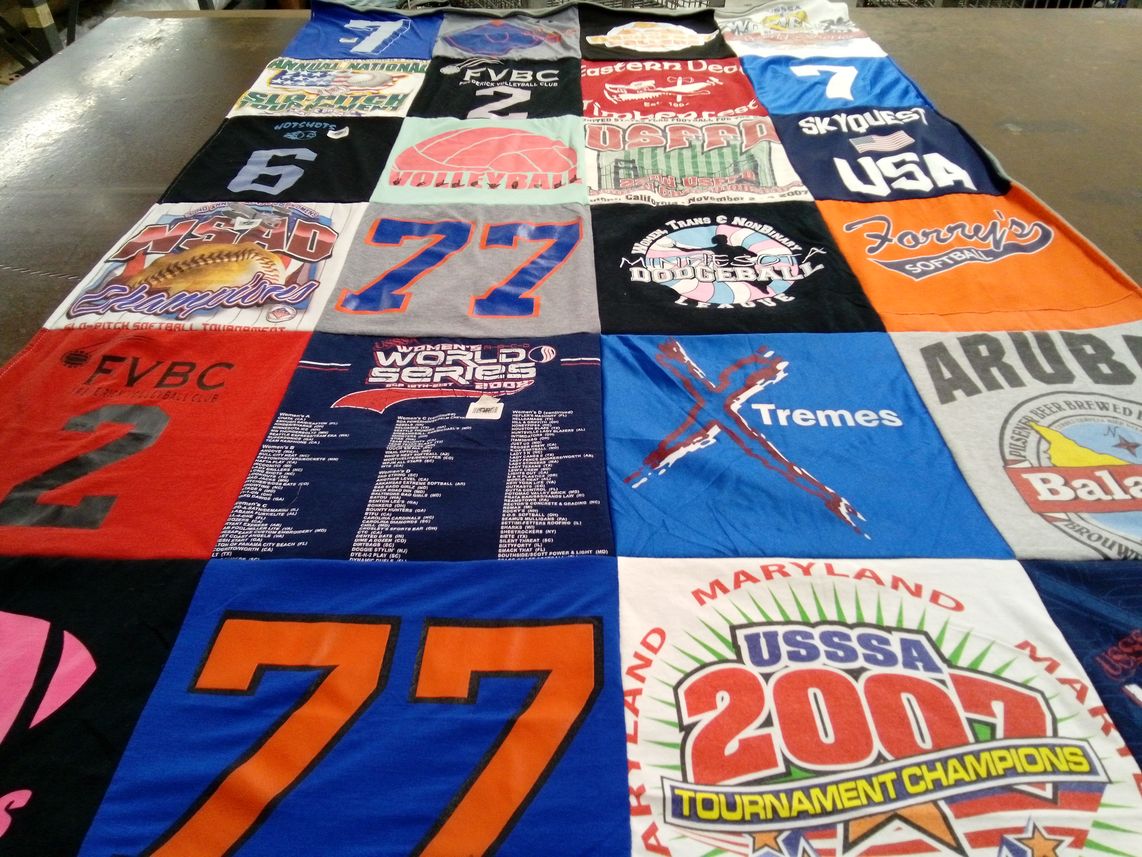 T-shirt quilt with softball, volleyball themes by Laura from MN