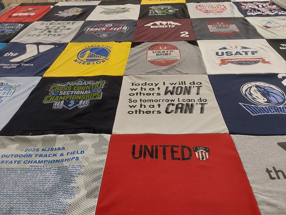 T-shirt quilt with track and field, cross country themes by Melissa from NJ