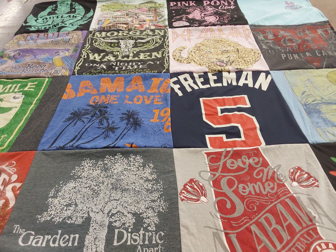 T-shirt quilt with travel, music themes by Timothy from FL