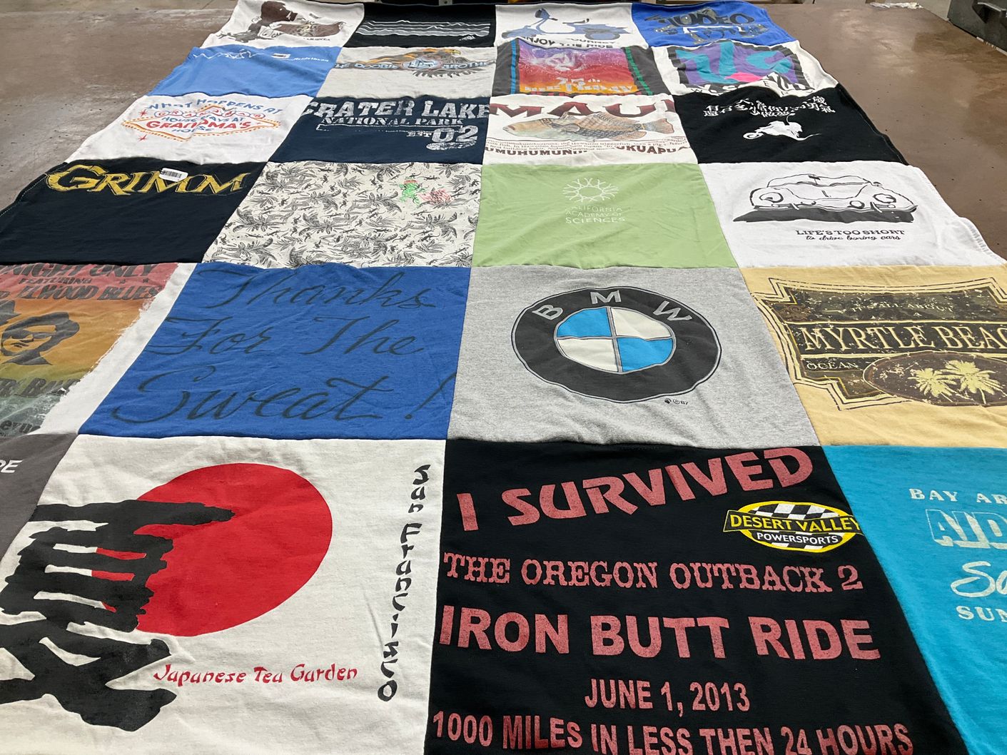 T-shirt quilt with travel, outdoor activities themes by Anna from OR