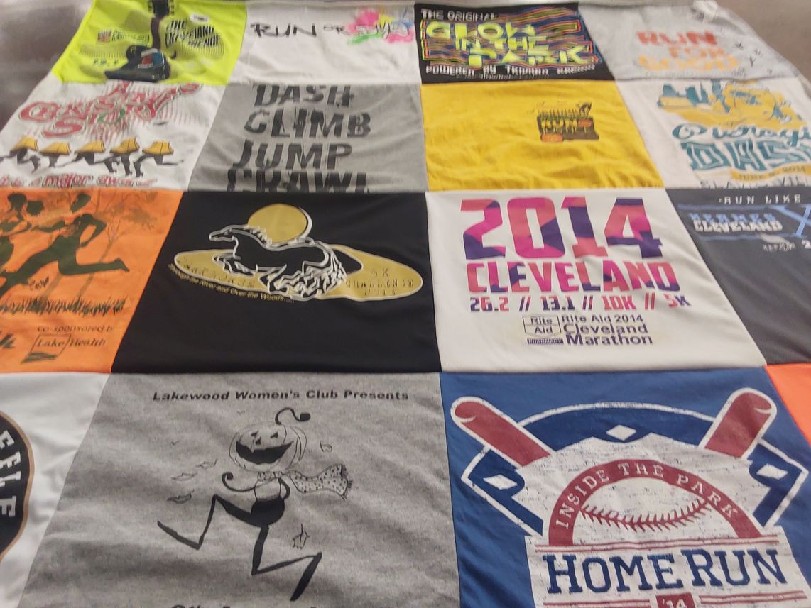 T-shirt quilt with running, sports themes by Sandra from OH