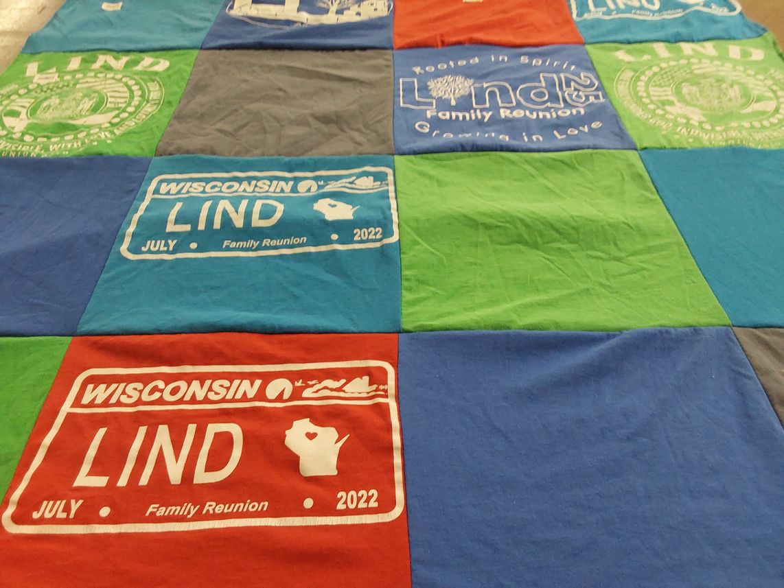 T-shirt quilt with family gatherings, reunions themes by Kelly from TX