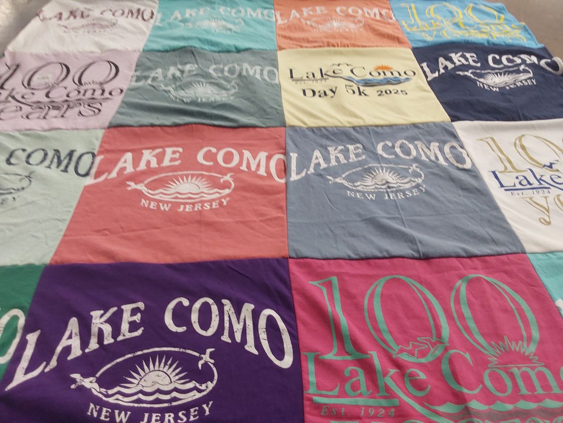 T-shirt quilt with running, community events themes by Amy from NJ