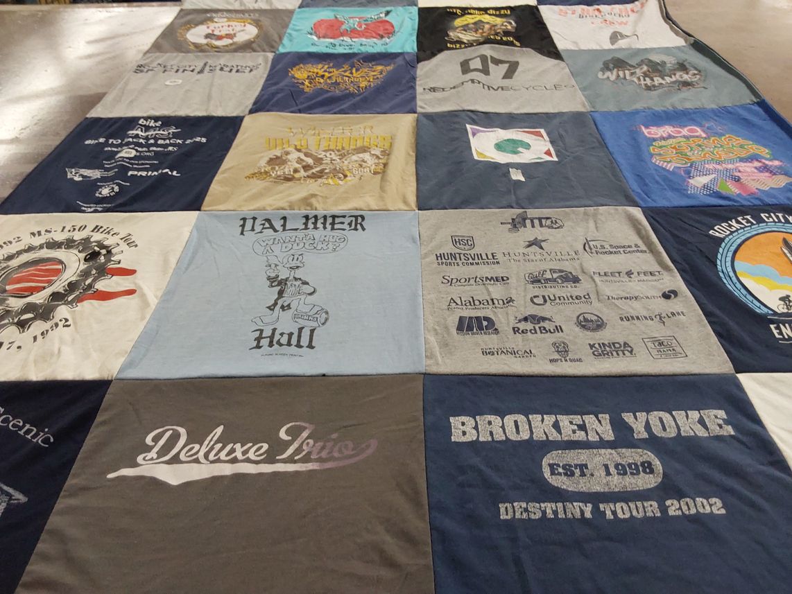 T-shirt quilt with cycling, sports themes by Bob from AL