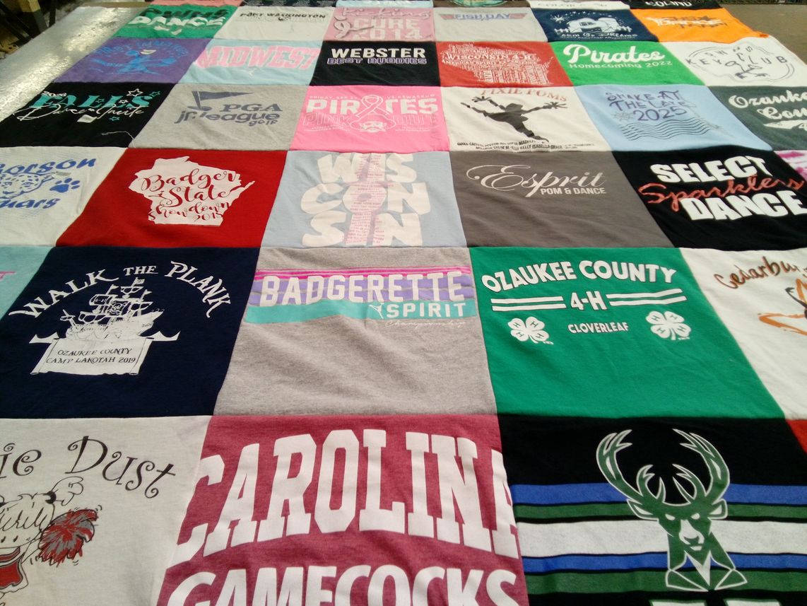 T-shirt quilt from university of wisconsin, carolina gamecocks by Stacy from WI