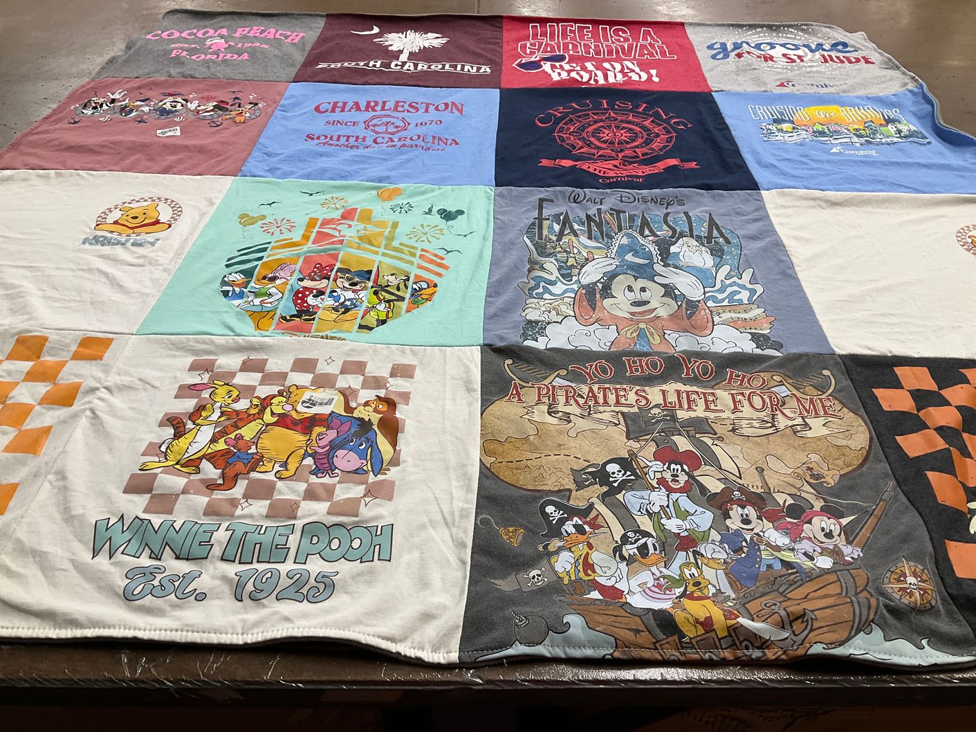 T-shirt quilt with disney, travel themes by Kristen from TN