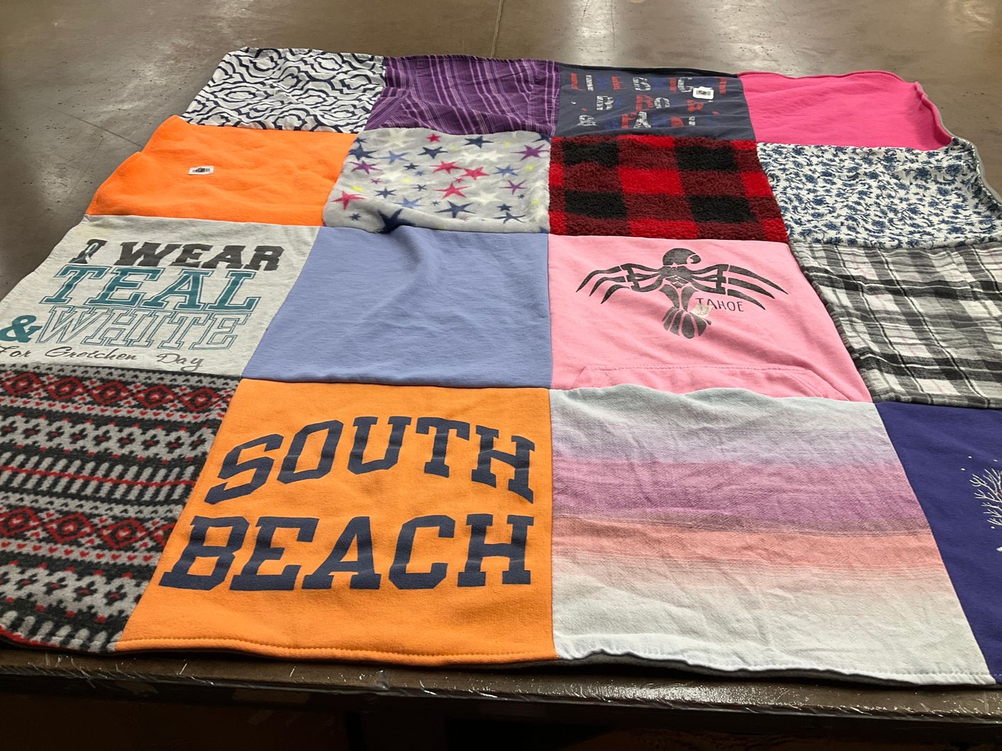 T-shirt quilt with beach, travel themes by Denise from MA