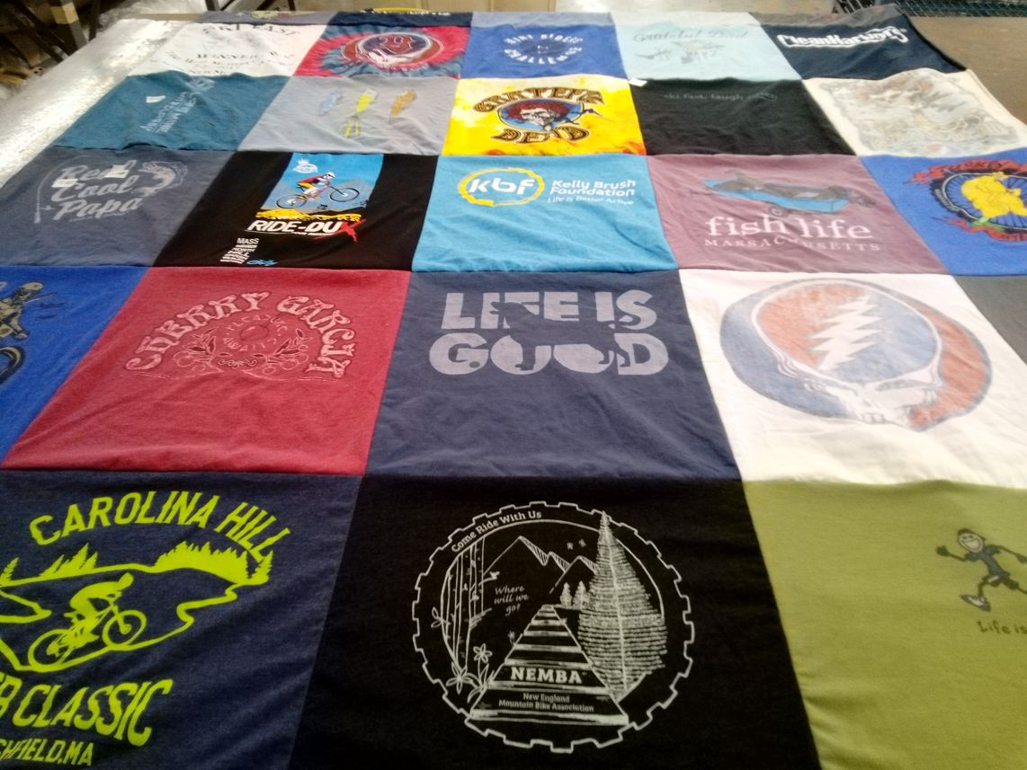 T-shirt quilt with biking, outdoor activities themes by Sara from MA