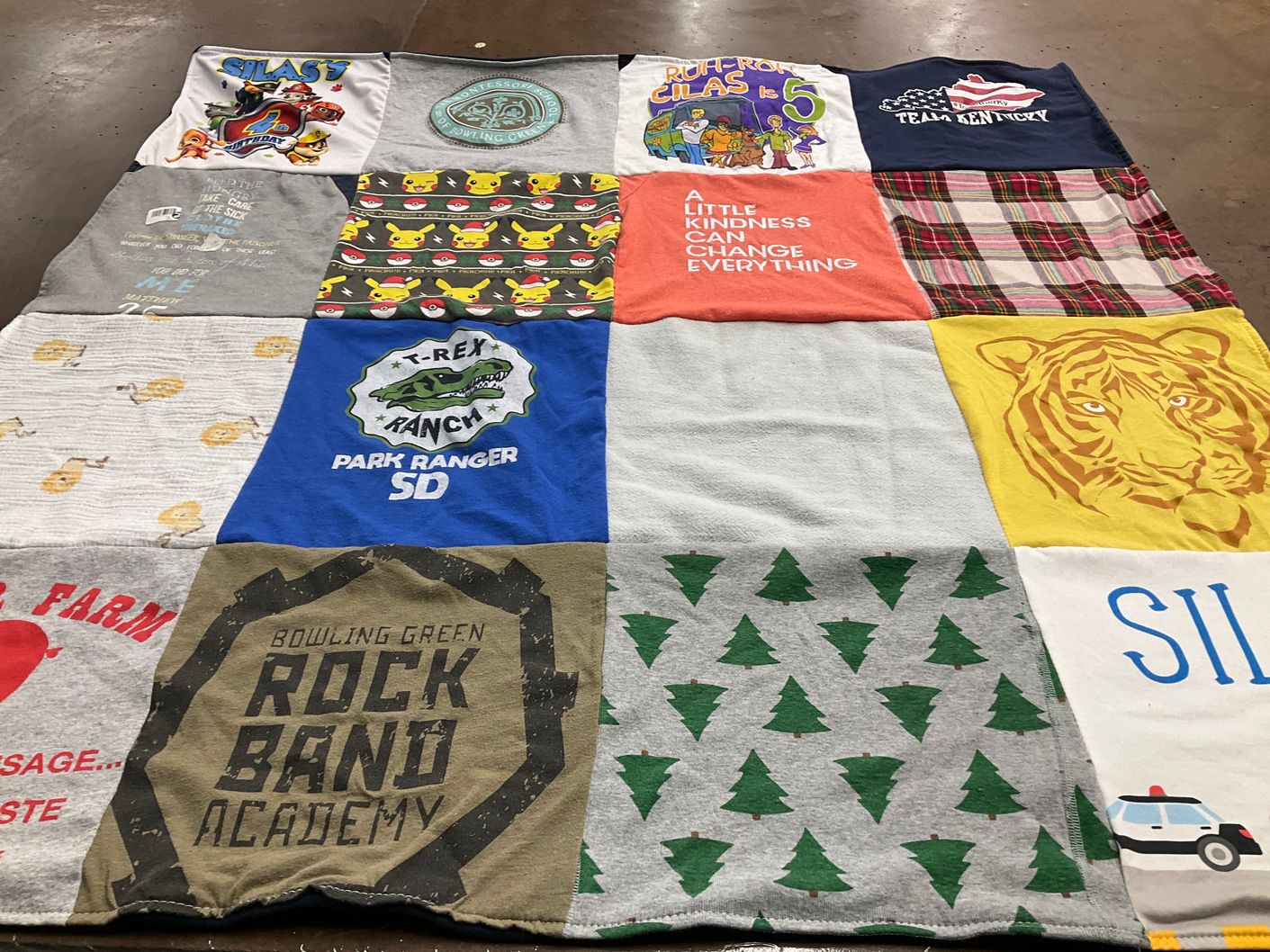 T-shirt quilt with animals, music themes by Lindsey from KY