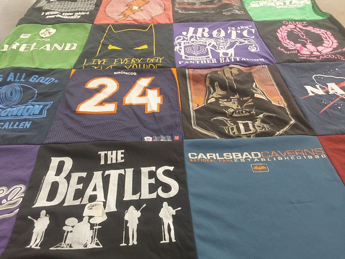 T-shirt quilt with music, travel themes by Kirstin from TX