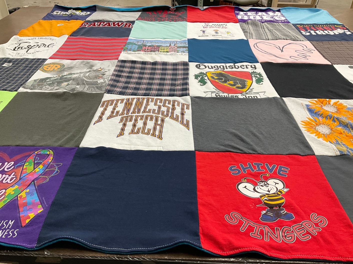 T-shirt quilt featuring shive stingers by Erin from NC