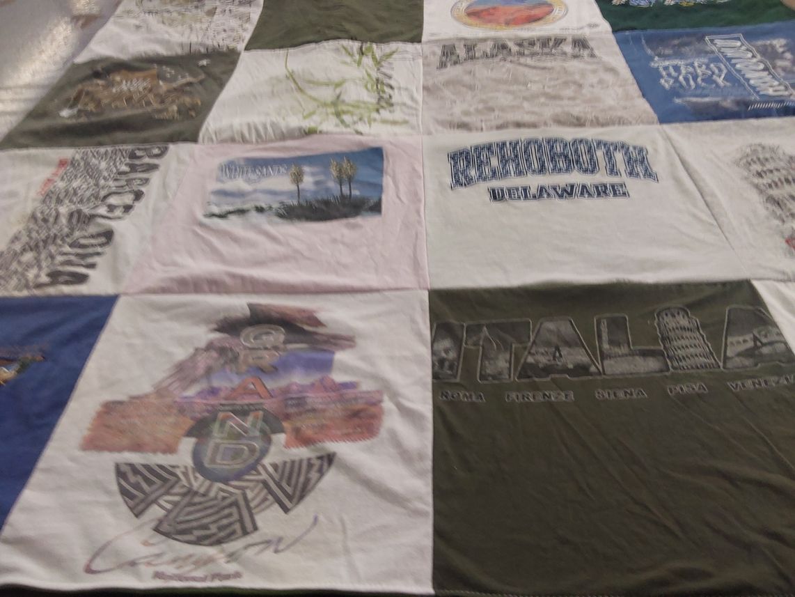 T-shirt quilt with travel, geography themes by Lily from WA