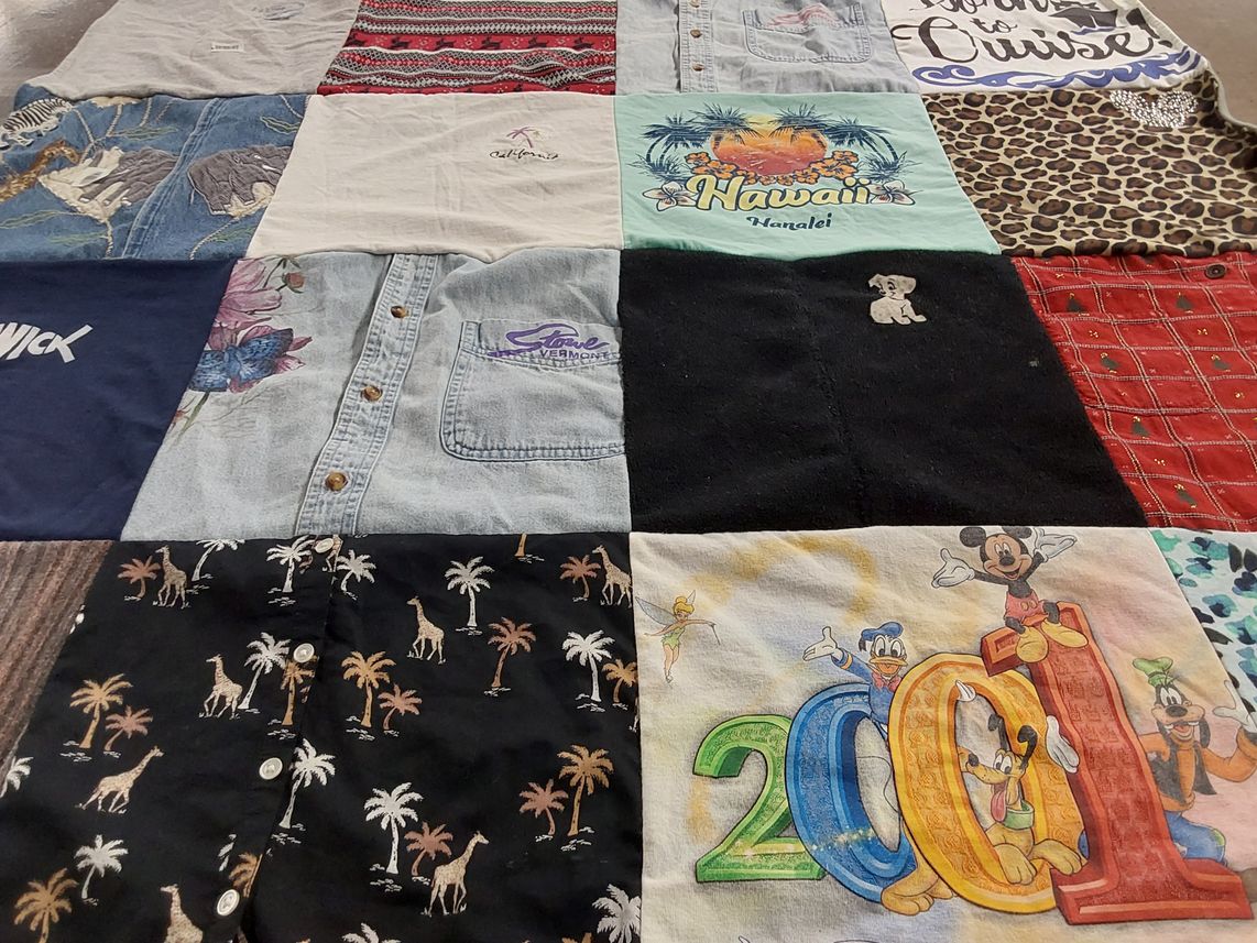 T-shirt quilt with travel, animals themes by Kathleen from RI