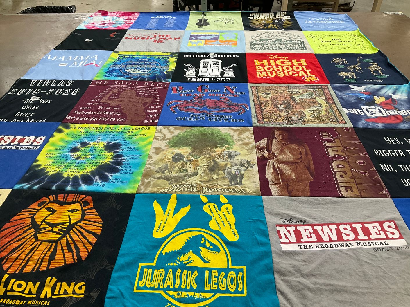 T-shirt quilt with musicals, theater themes by Dionette from WI