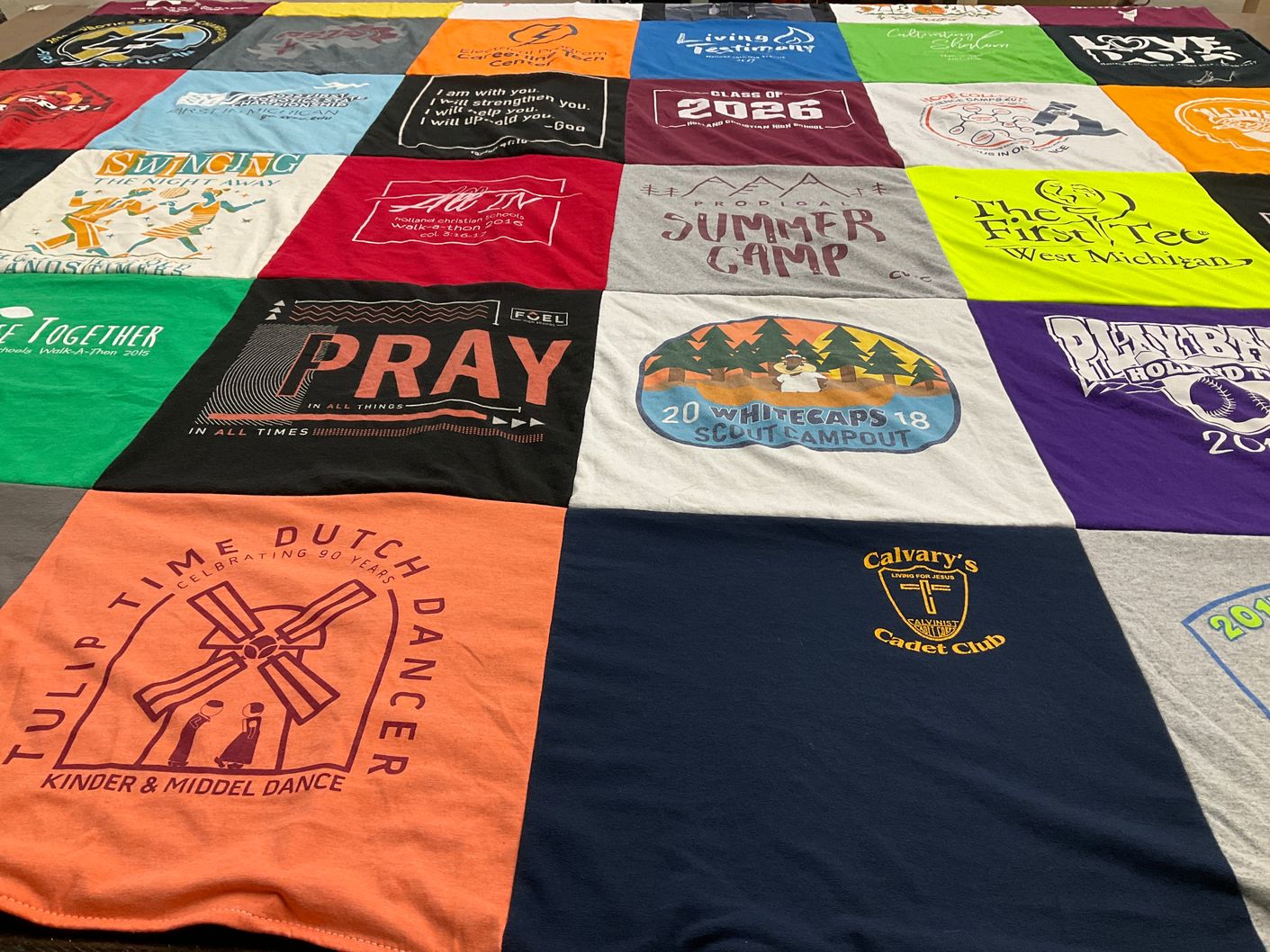 T-shirt quilt with camping, dancing themes by Carrie from MI