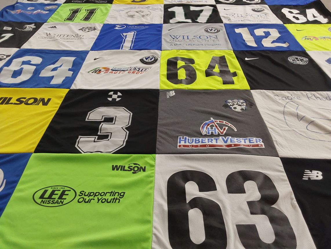 T-shirt quilt with soccer themes by Cindy from NC
