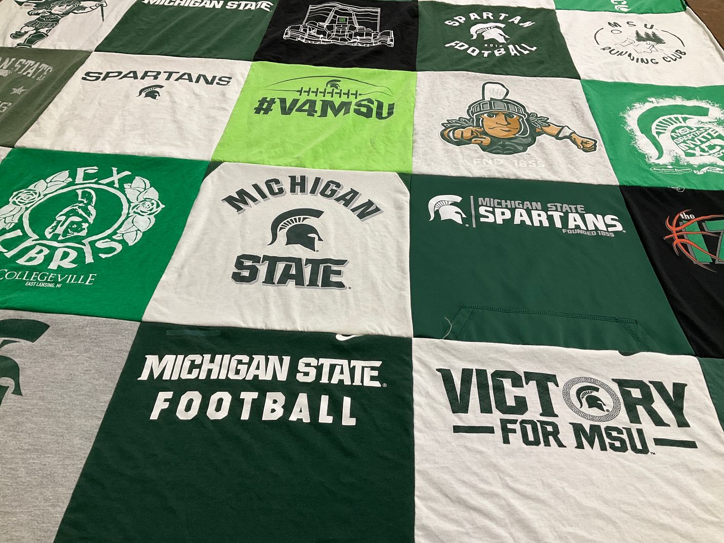 T-shirt quilt featuring michigan state university football, michigan state spartans by Kathryn from CO