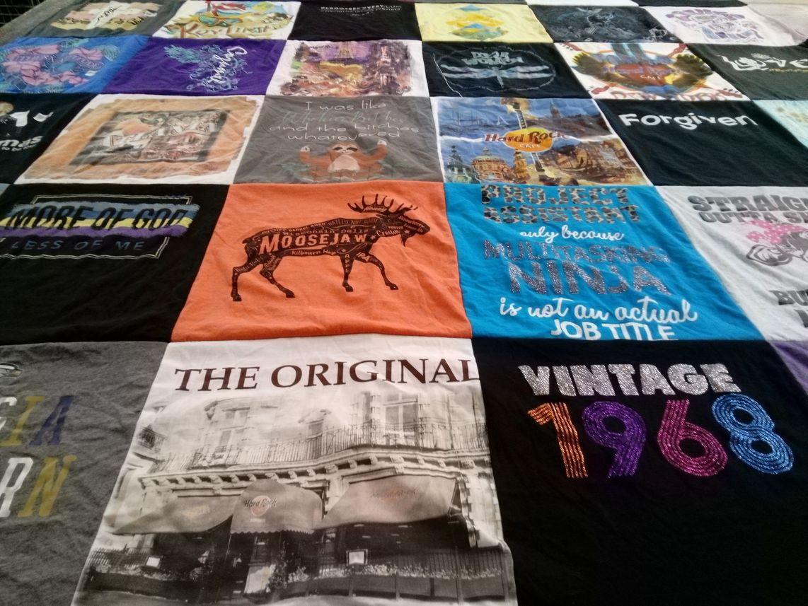 T-shirt quilt with travel, music themes by Lesa from TX