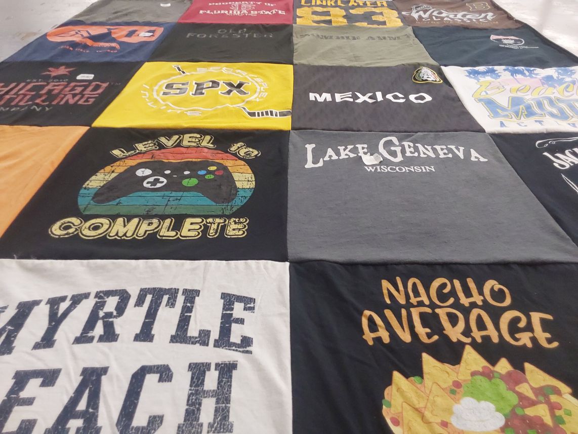 T-shirt quilt with gaming, travel themes by Yvette from IL