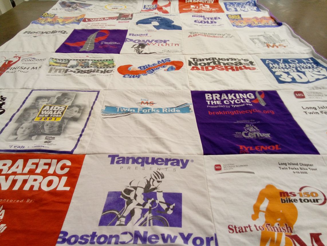 T-shirt quilt with biking, fundraising themes by Lisa from NY