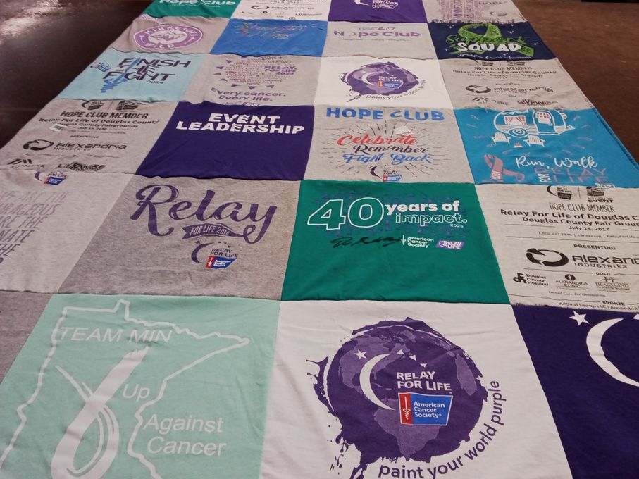 T-shirt quilt with cancer awareness, community service themes by Mary from MN