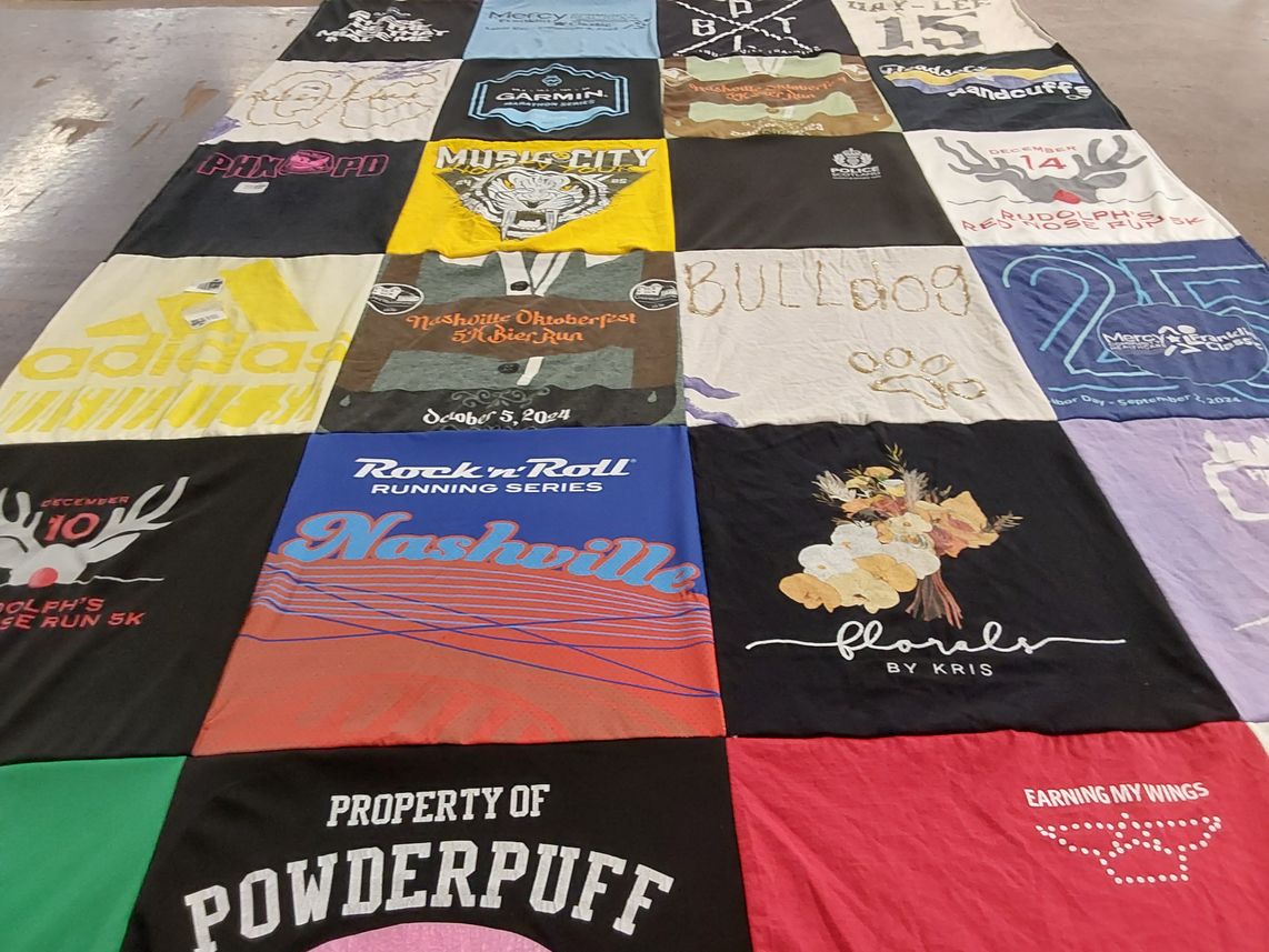 T-shirt quilt with running, sports themes by Hailey from MA