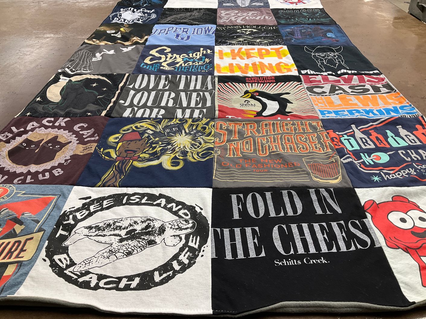 T-shirt quilt with beach, music themes by Leslie from IL