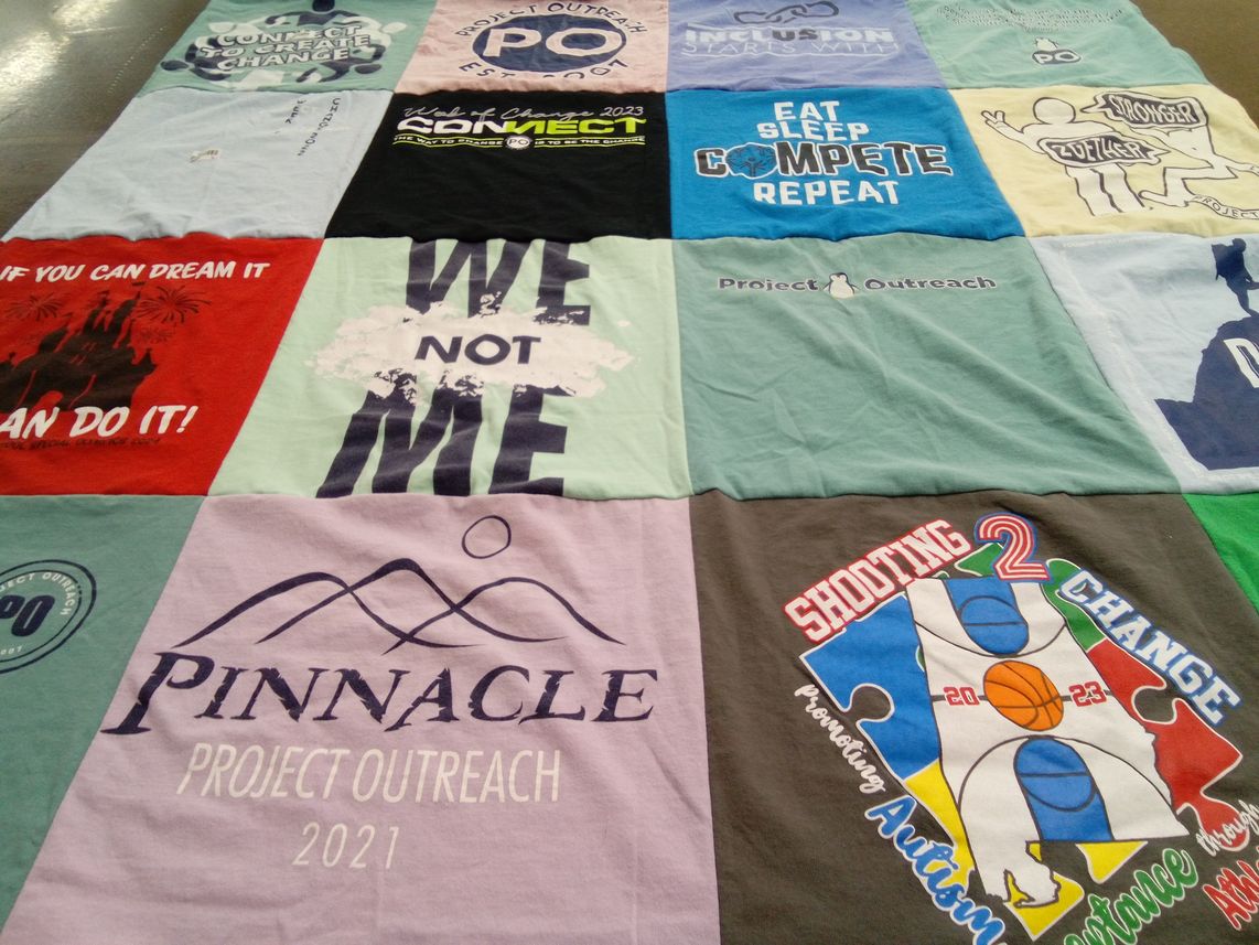 T-shirt quilt with community service, inclusion themes by Suzanne from AL