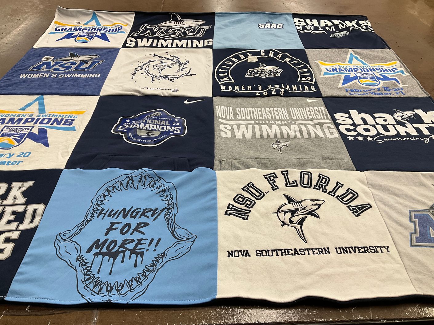 T-shirt quilt featuring nova southeastern university swimming by Lauren from FL