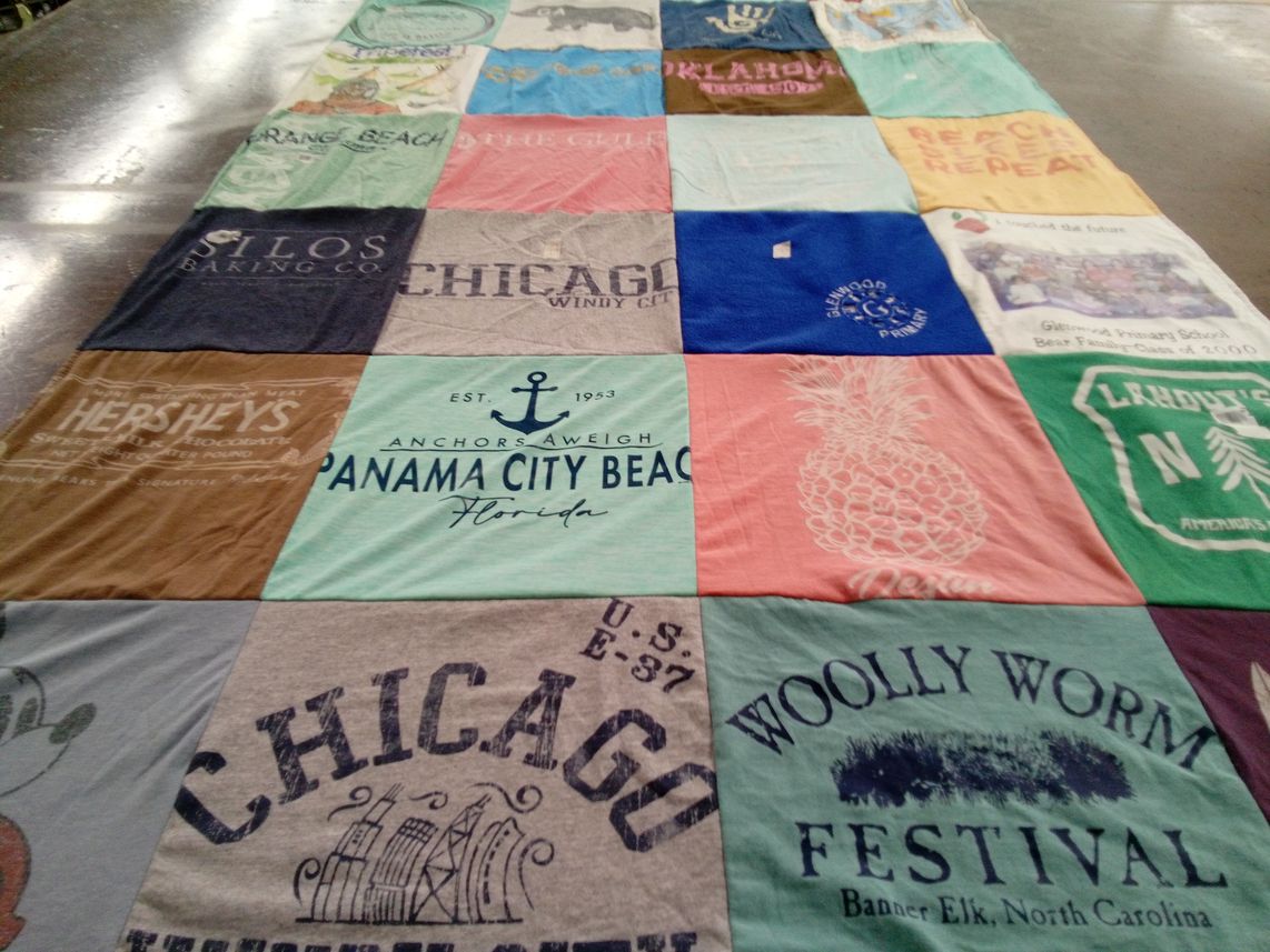 T-shirt quilt with travel, festivals themes by Agnes from GA