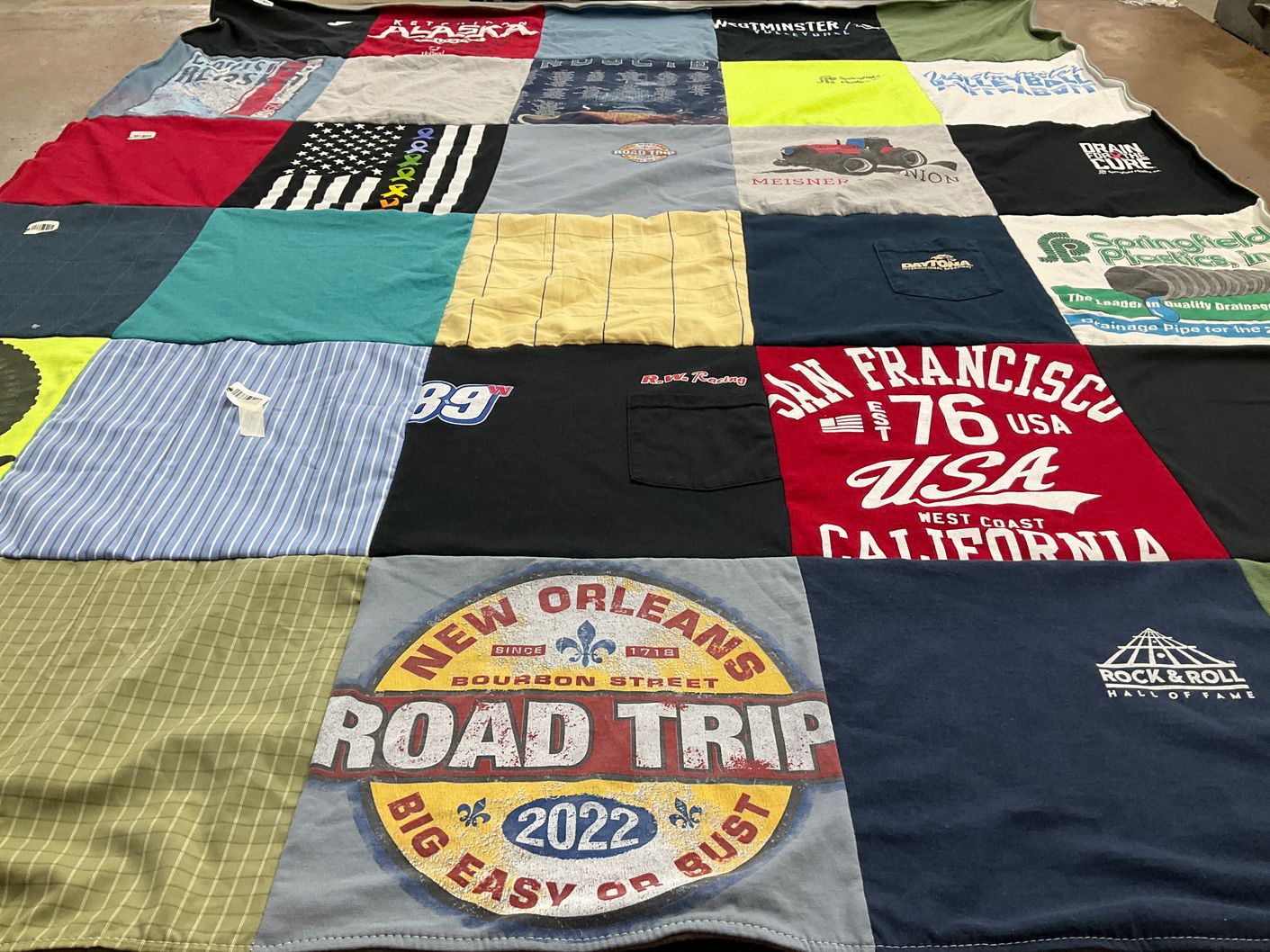 T-shirt quilt with travel, music themes by Shanel from IL