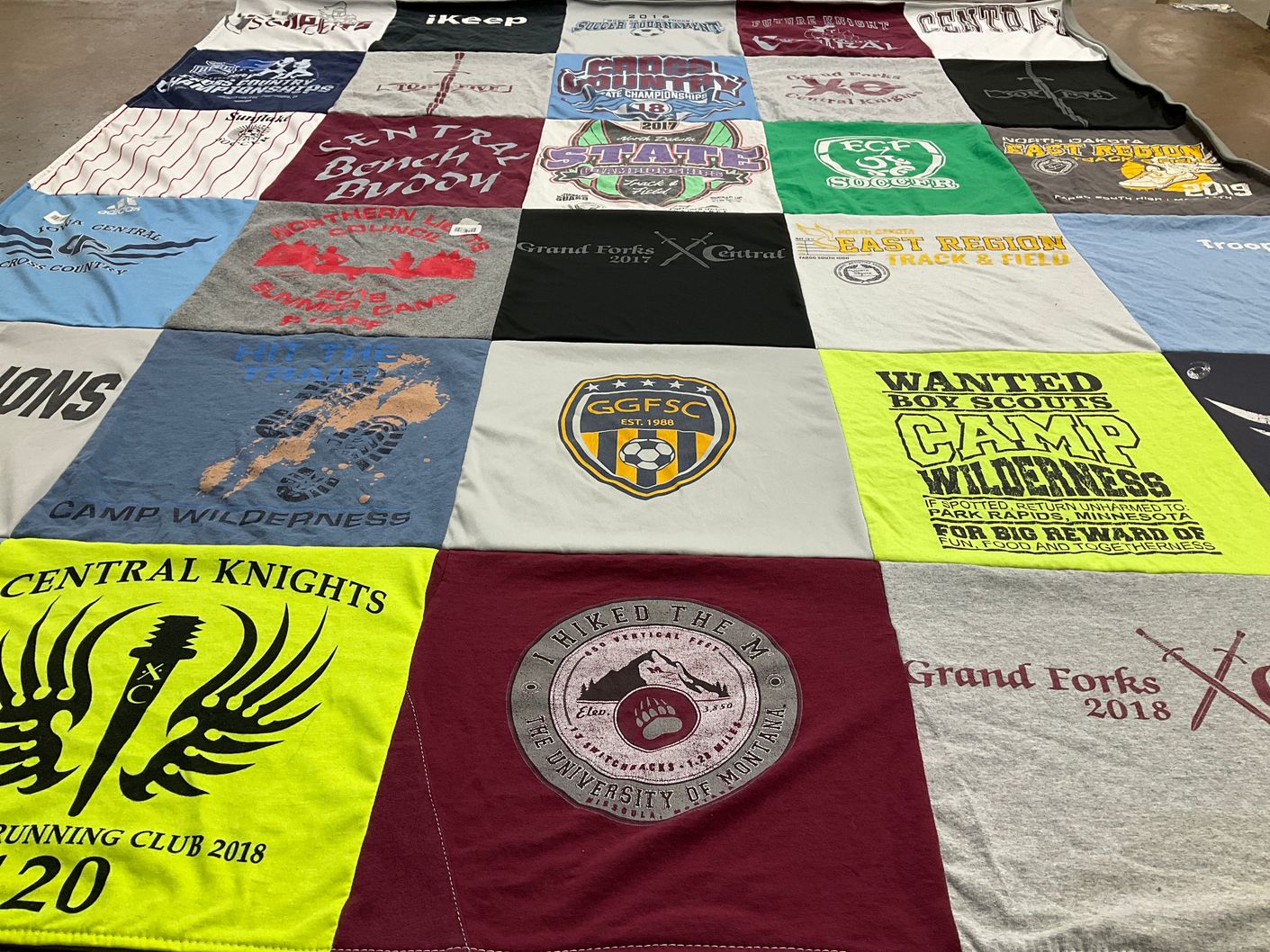 T-shirt quilt featuring eastern north dakota track and field by Christine from OR