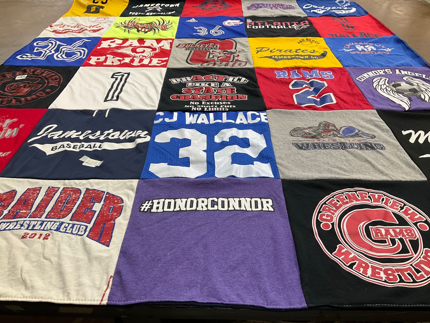 T-shirt quilt featuring raider wrestling club, greenview wrestling by Jonathan from TN