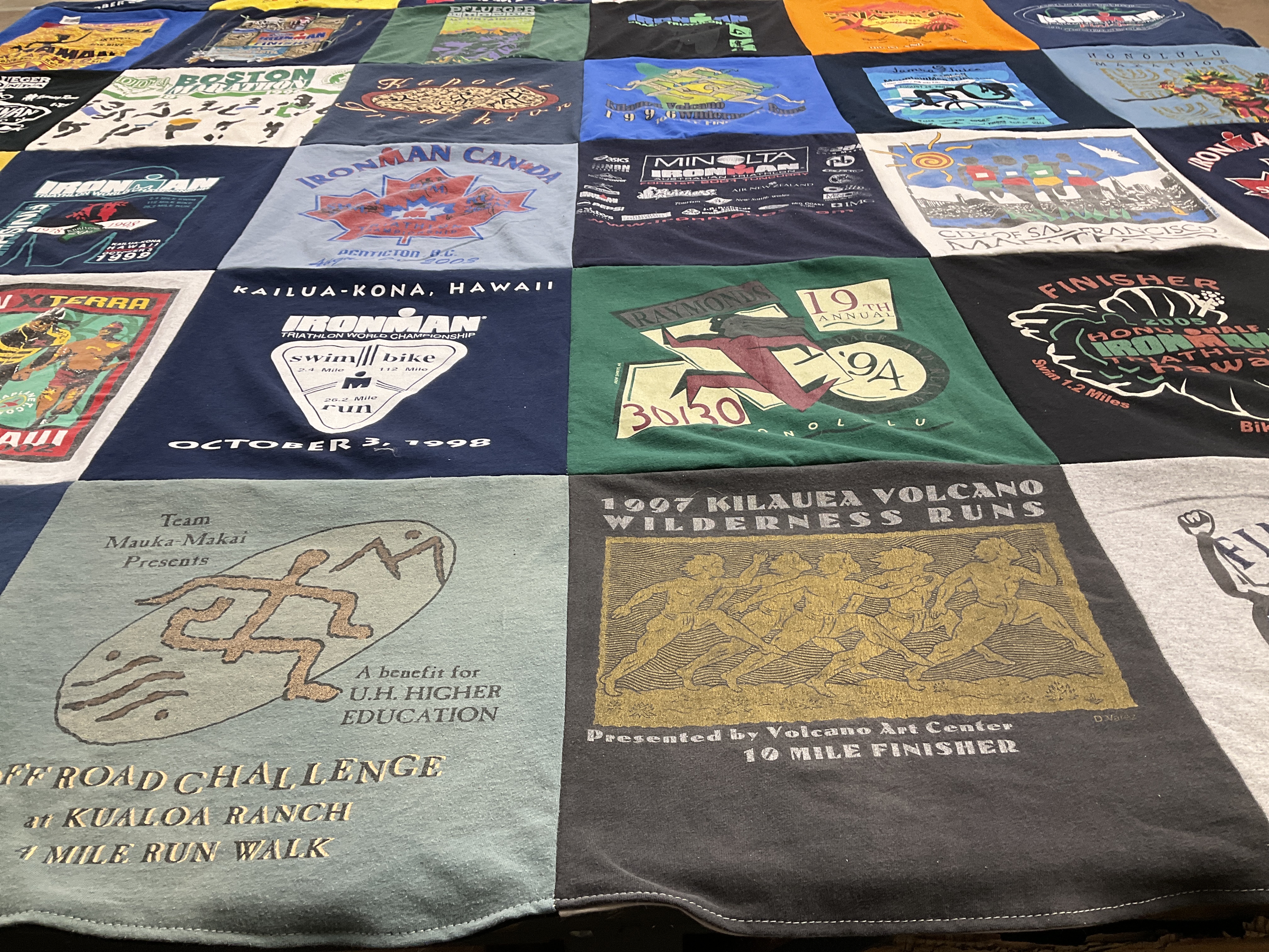 T-shirt quilt with triathlon, biathlon themes by Joseph from WA