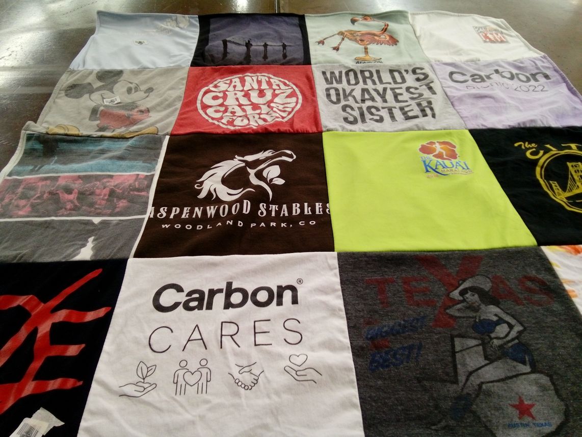 T-shirt quilt with traveling, sisterhood themes by Maria from CA