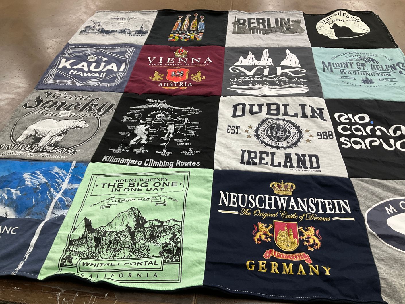 T-shirt quilt with travel, hiking themes by Elena from NY